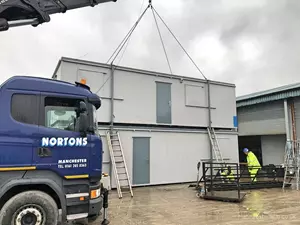 Delivery & stacking installation of double cabin setup in Manchester