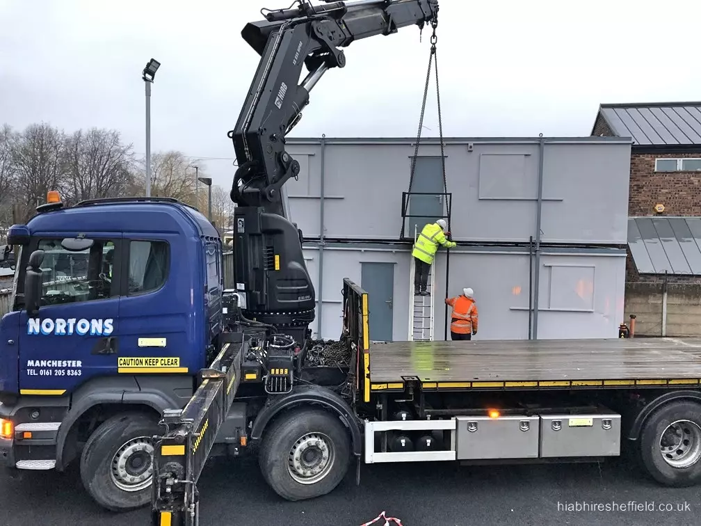 Delivery & stacking installation of double cabin setup in Manchester